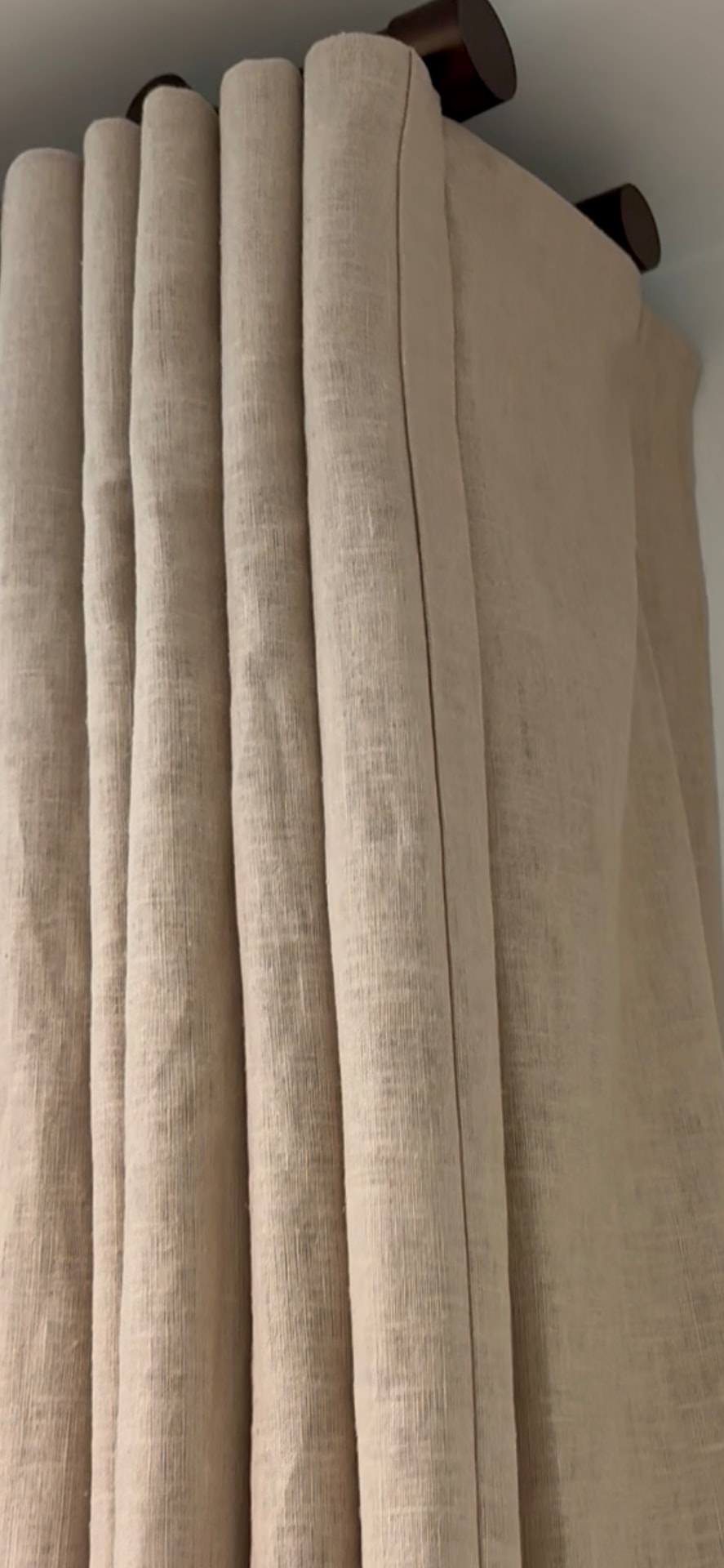 Linen drapery side return detail for bedroom light control