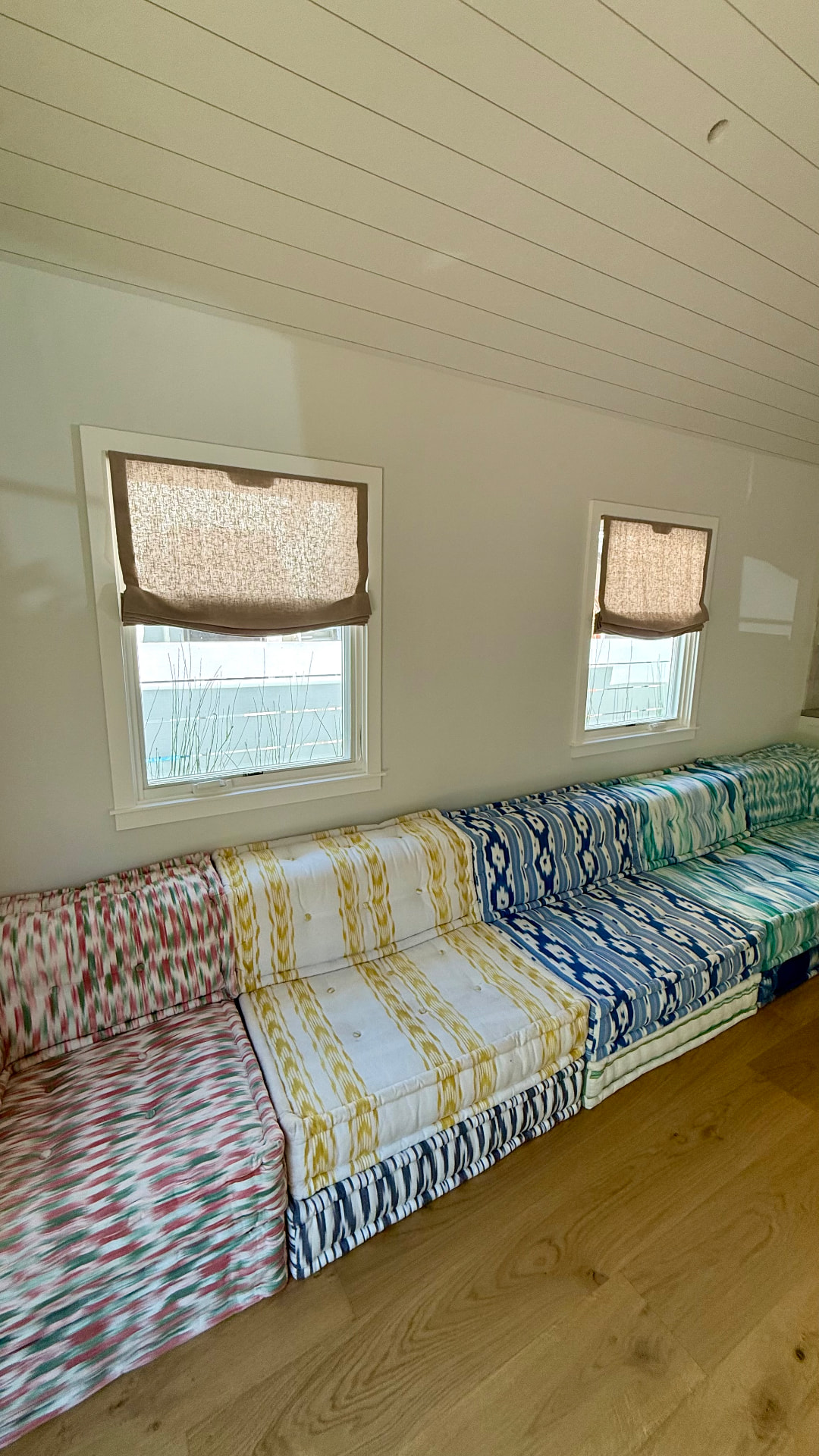 Linen Roman shades filtering daylight in Venice Beach house