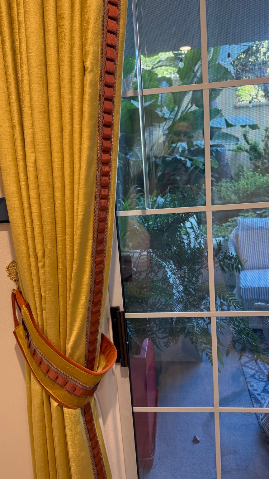 Decorative leading edge trim on sunflower velvet drapery in Beverly Hills office