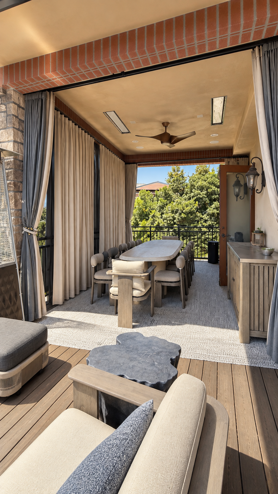 Open Sunbrella outdoor drapery framing covered wraparound deck in Thousand Oaks California