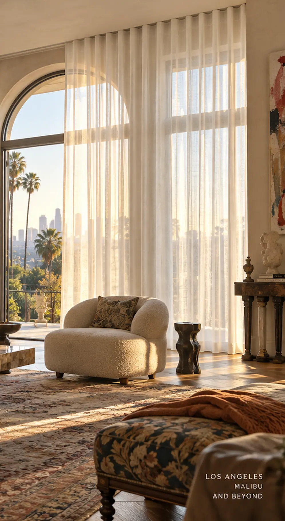 Layered sheer and lined drapery in a finished coastal interior